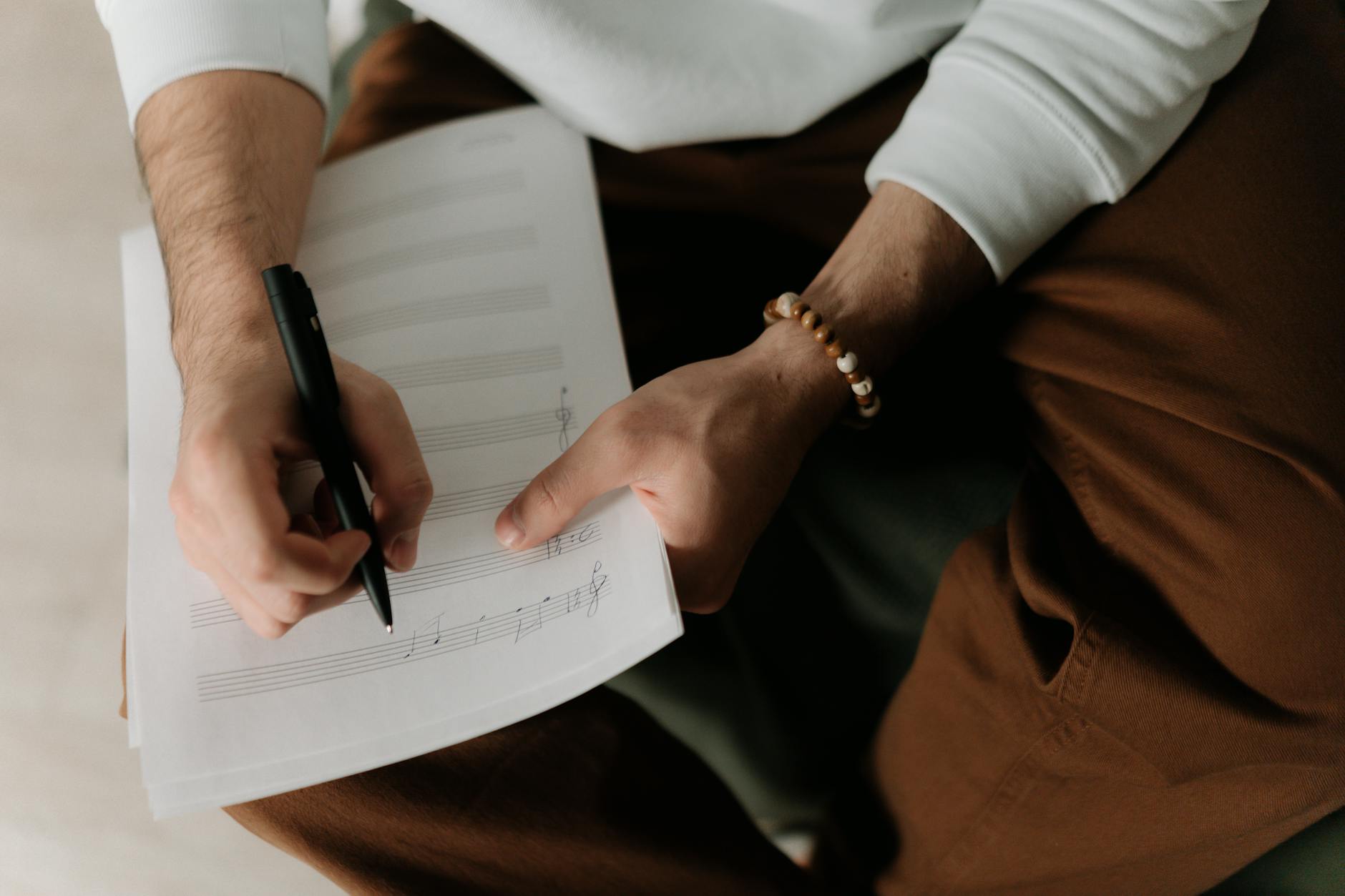 songwriter writing (Photo: cottonbro studio / Pexels)