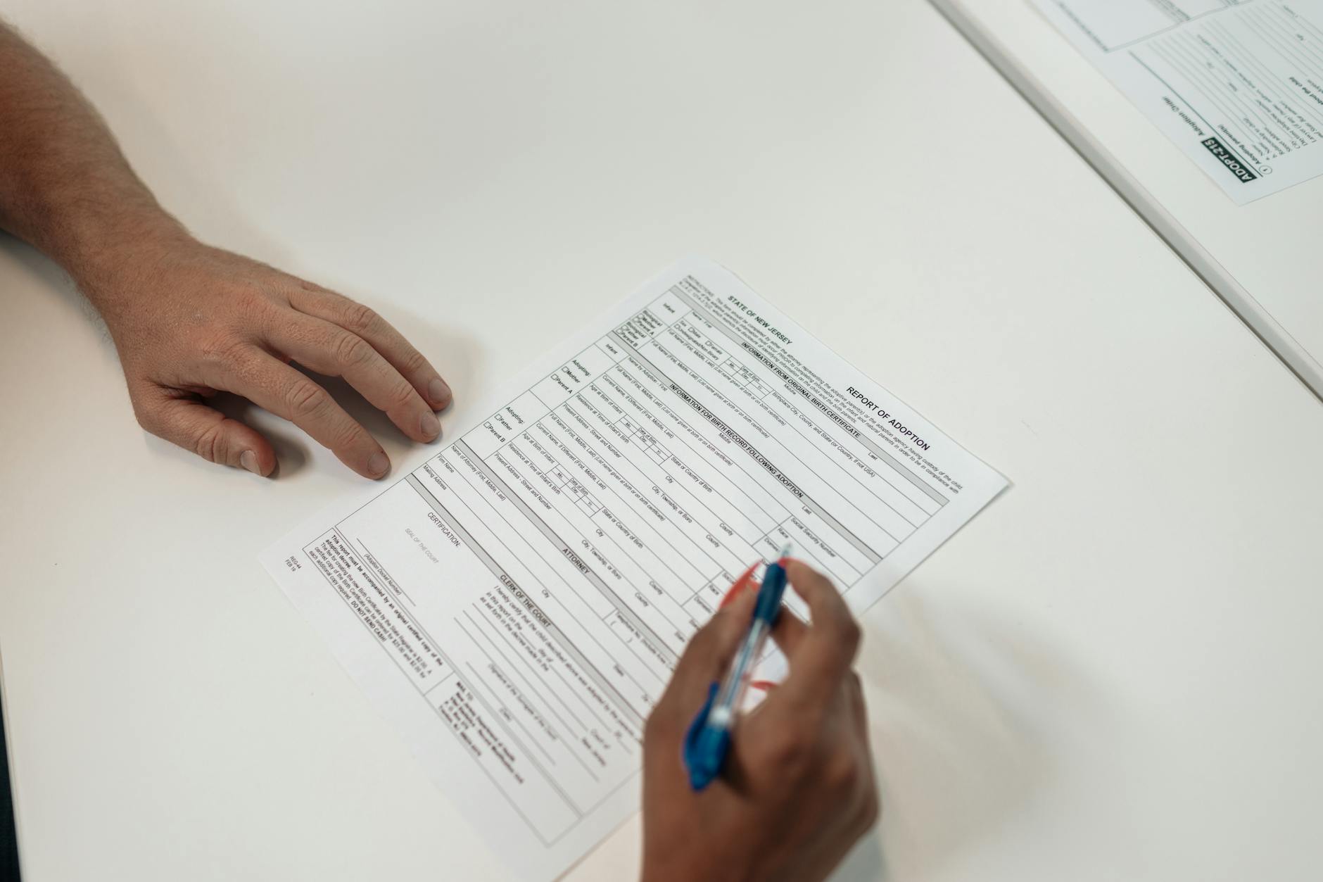 permit application paperwork desk (Photo: Kindel Media / Pexels)