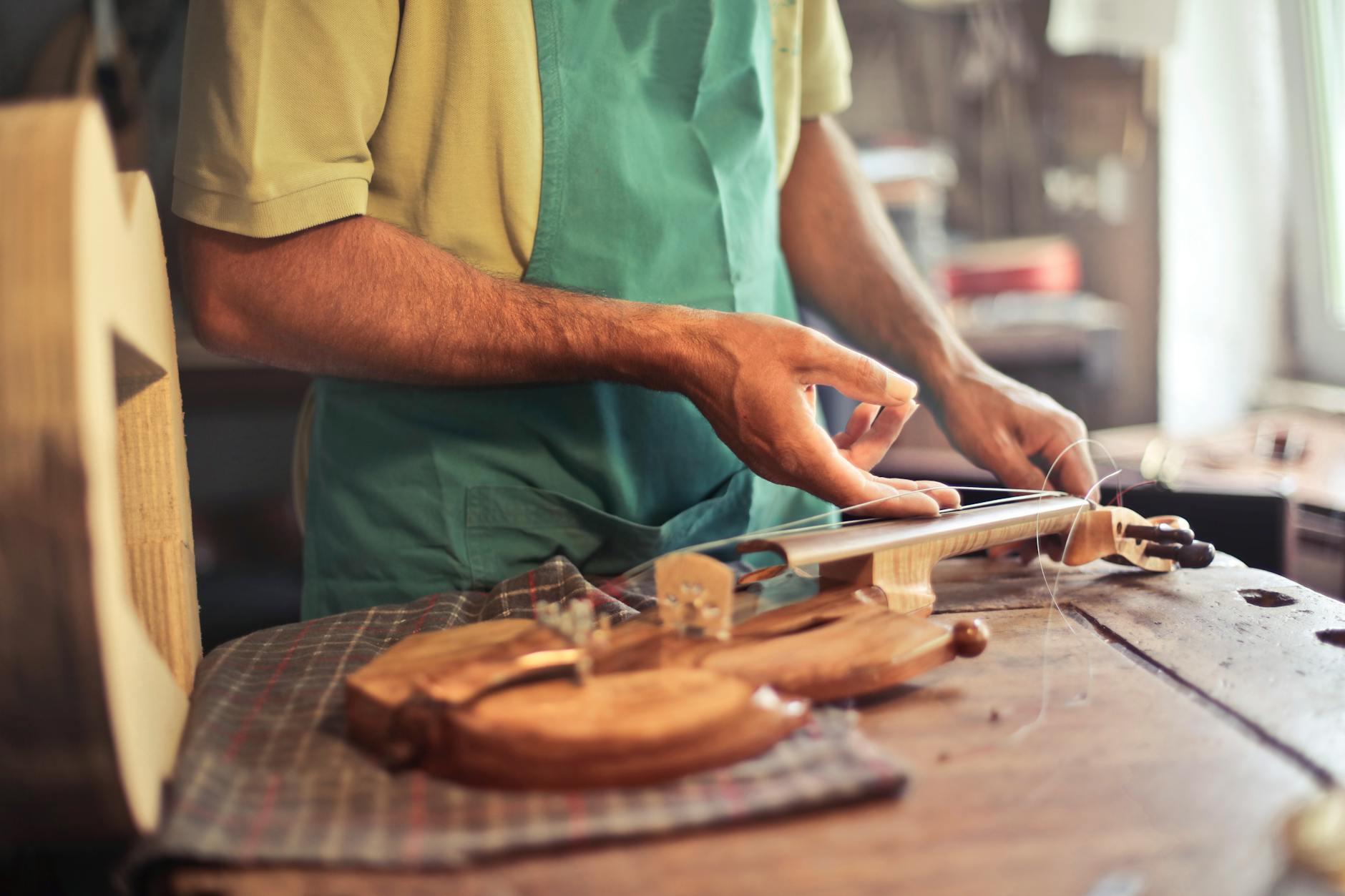 instrument making student (Photo: Andrea Piacquadio / Pexels)