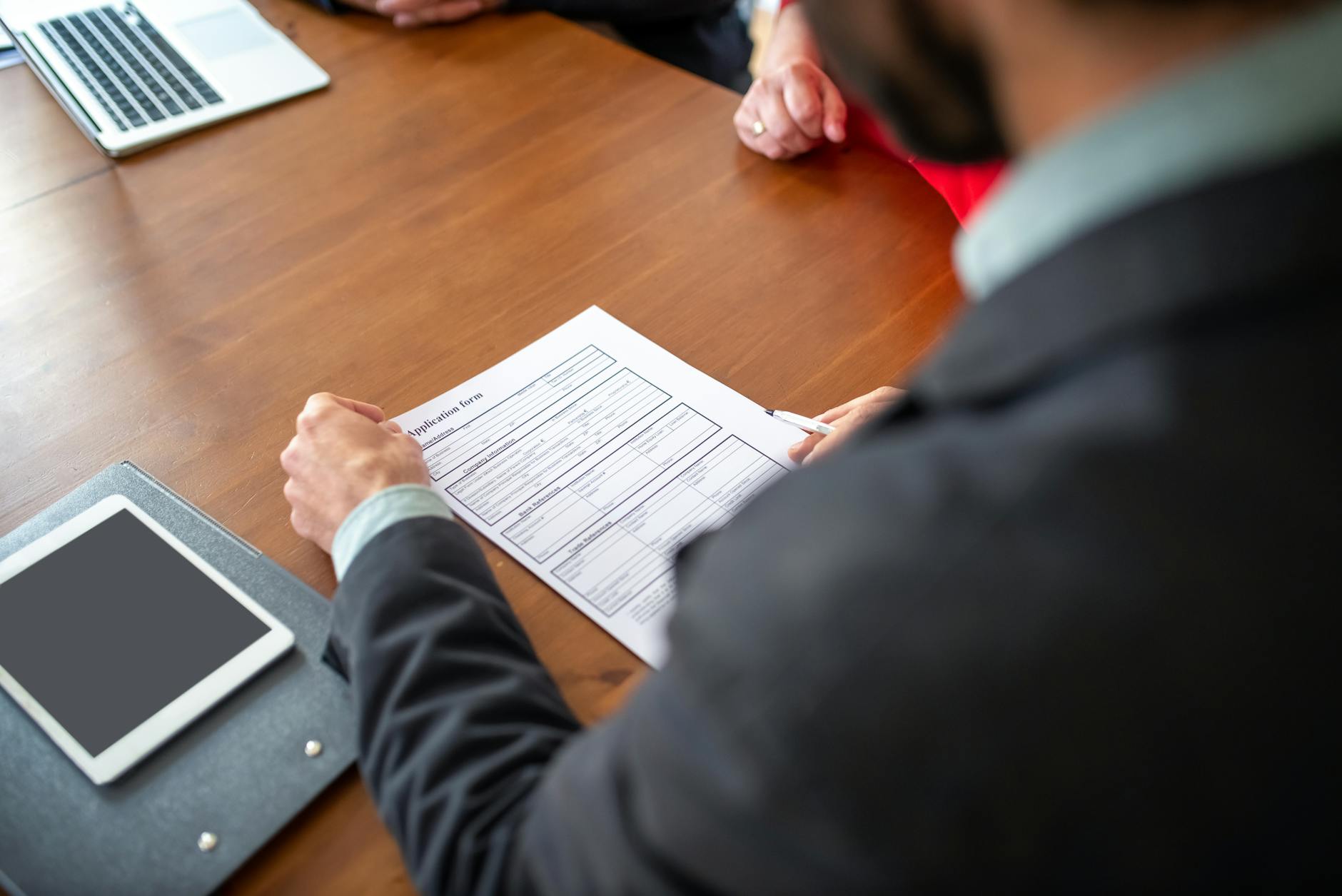 permit application paperwork desk (Photo: Kampus Production / Pexels)