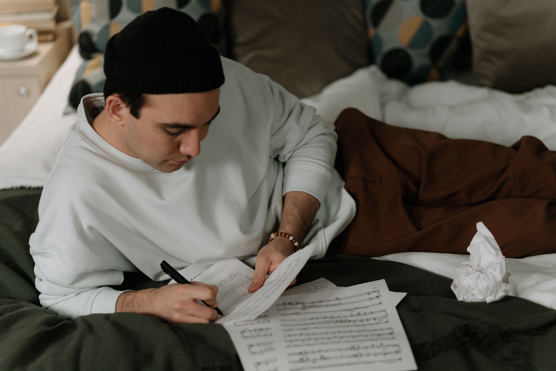 lyrics notebook pen (Photo: cottonbro studio / Pexels)