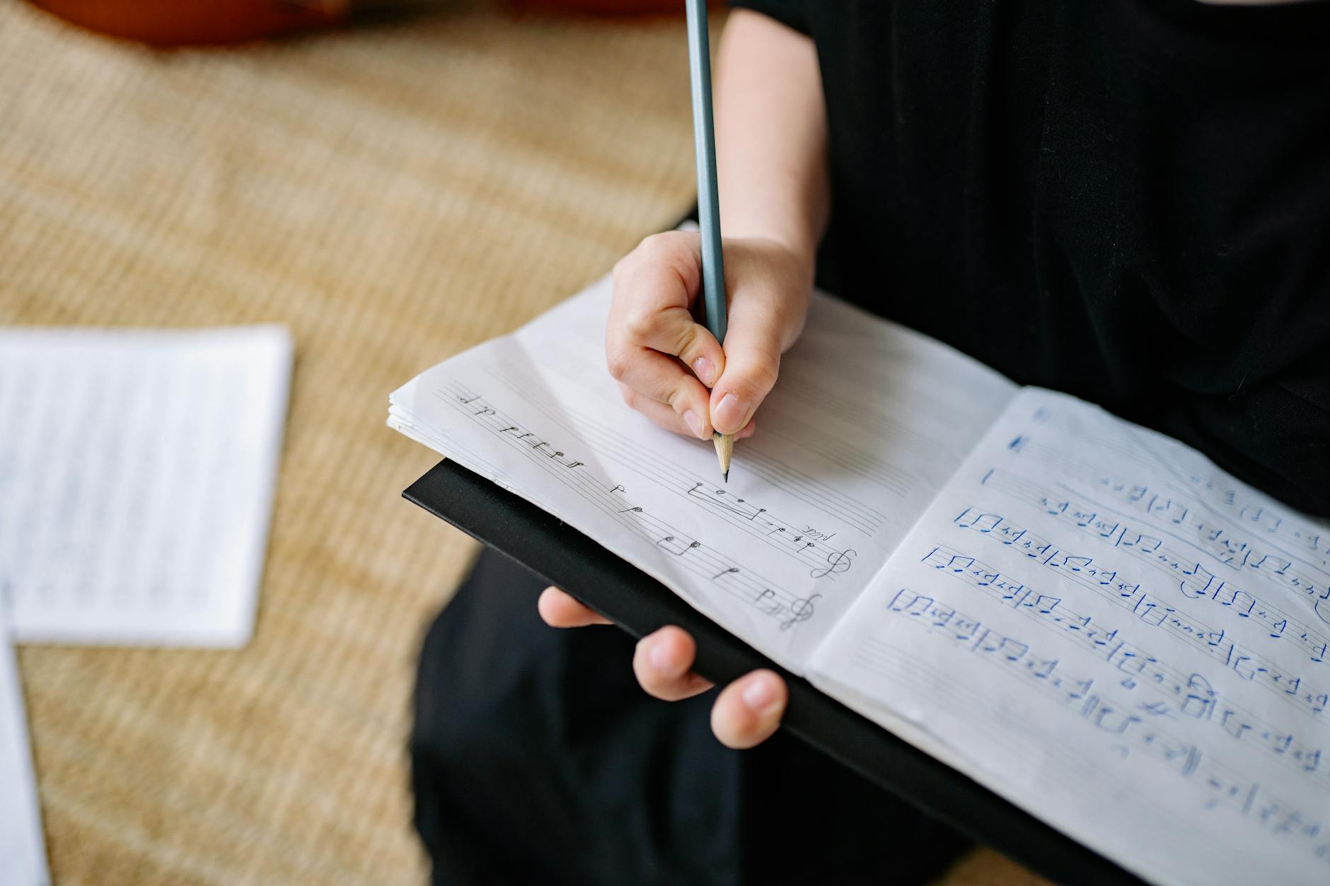 musician choice notebook reflection (Photo: Yan Krukau / Pexels)