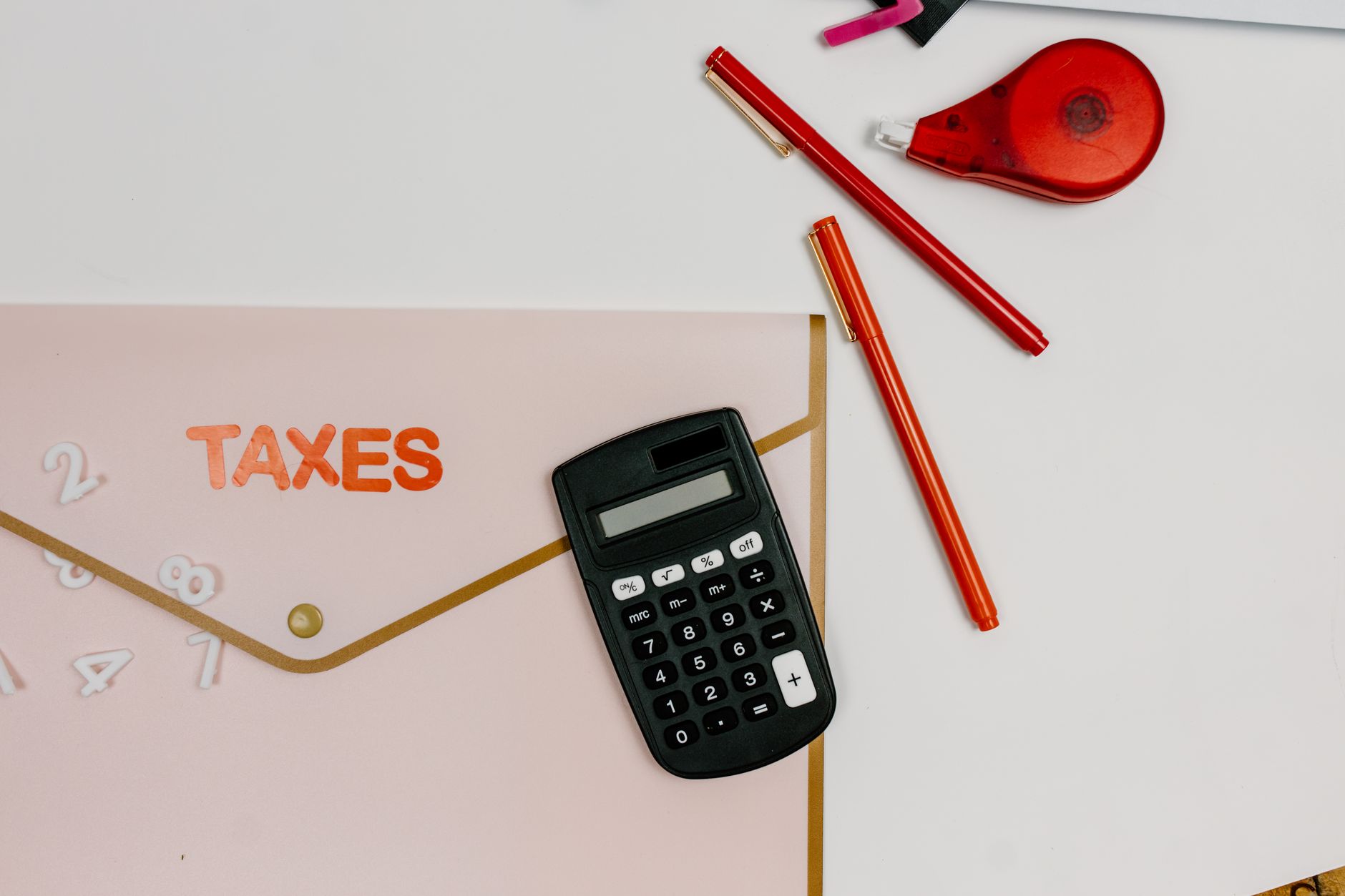 tax document calculator desk (Photo: Tara Winstead / Pexels)