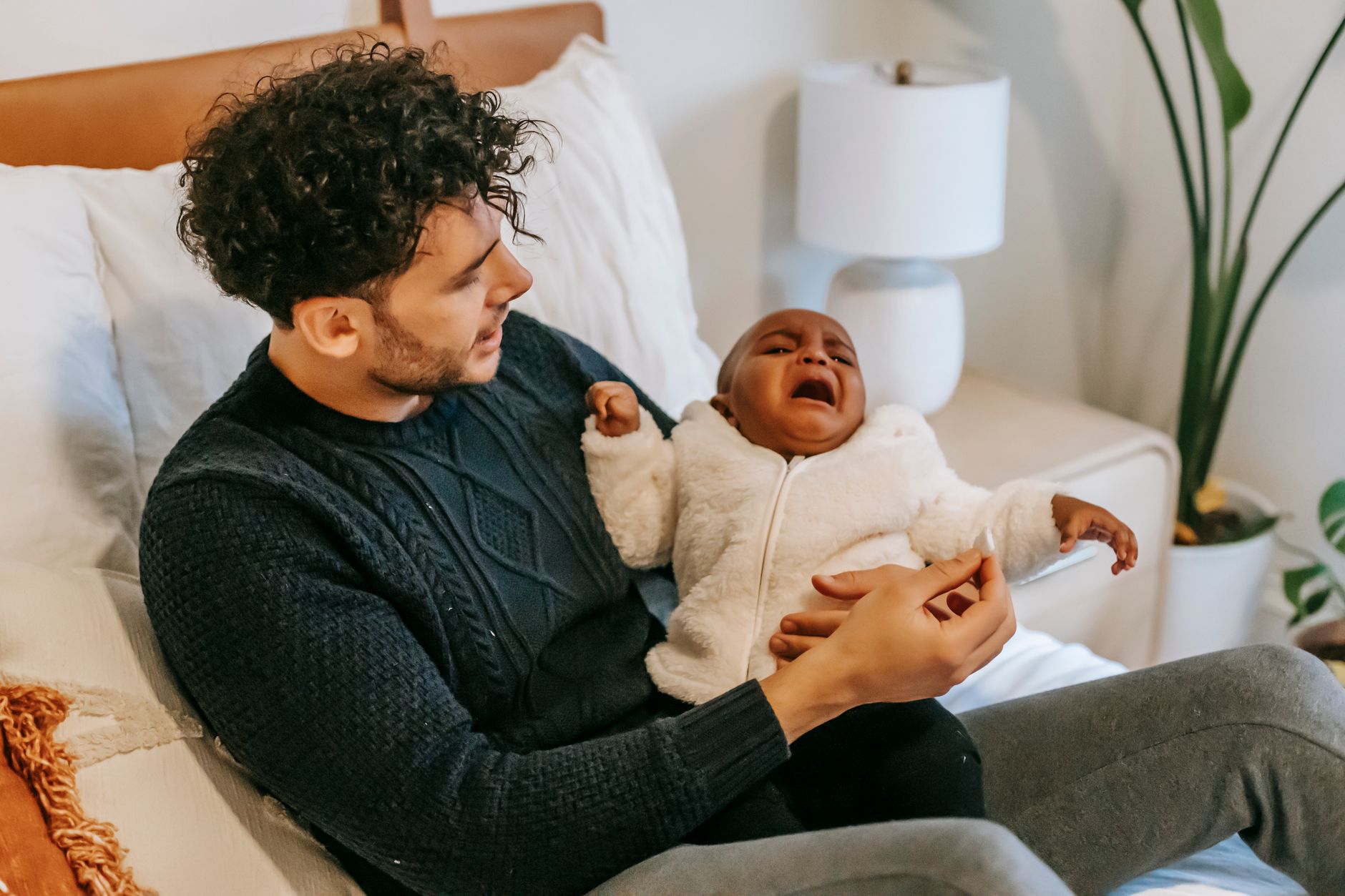tired parent baby home (Photo: William  Fortunato / Pexels)