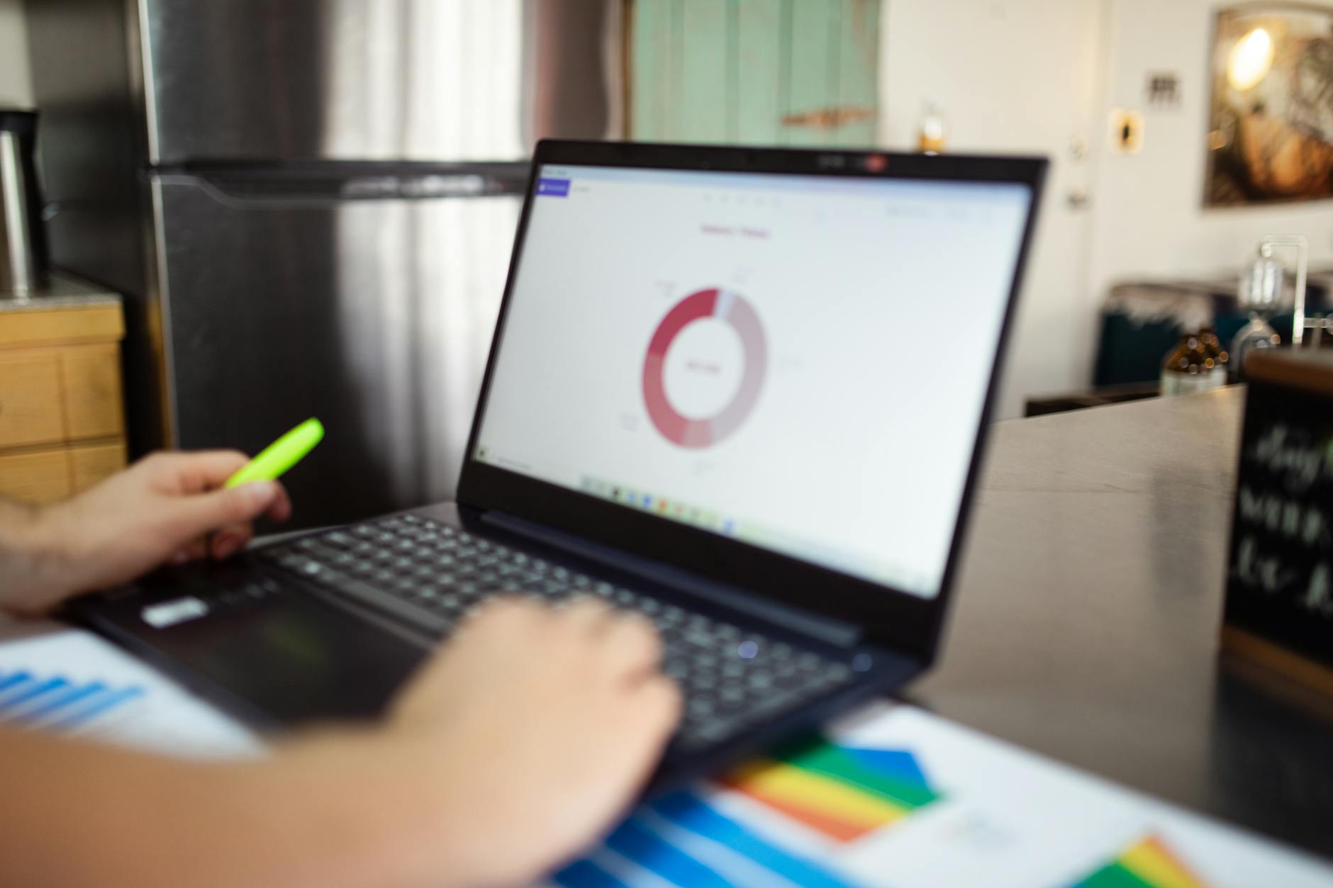 analytics graph laptop hand (Photo: RDNE Stock project / Pexels)