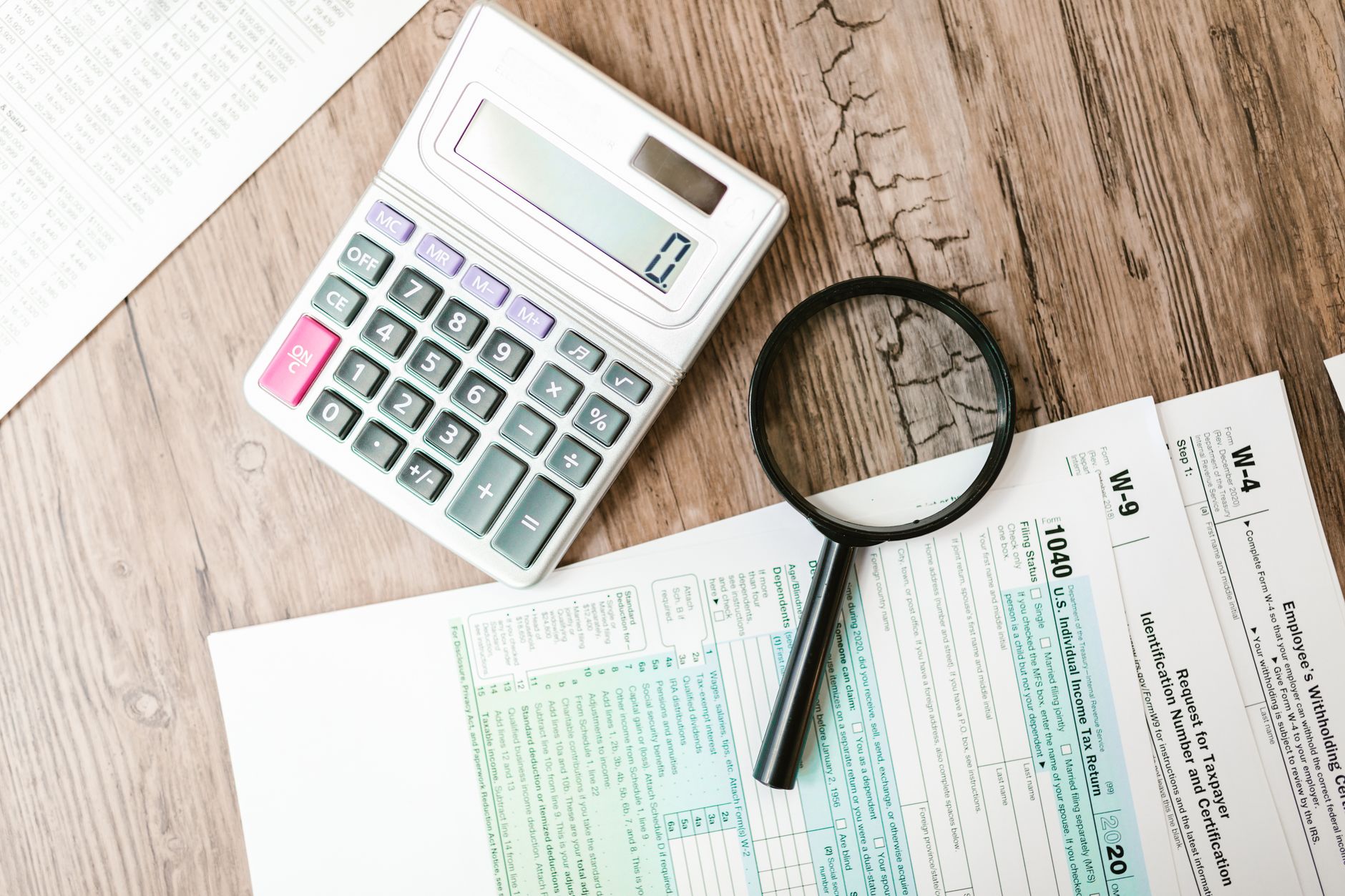 tax document calculator desk (Photo: RDNE Stock project / Pexels)