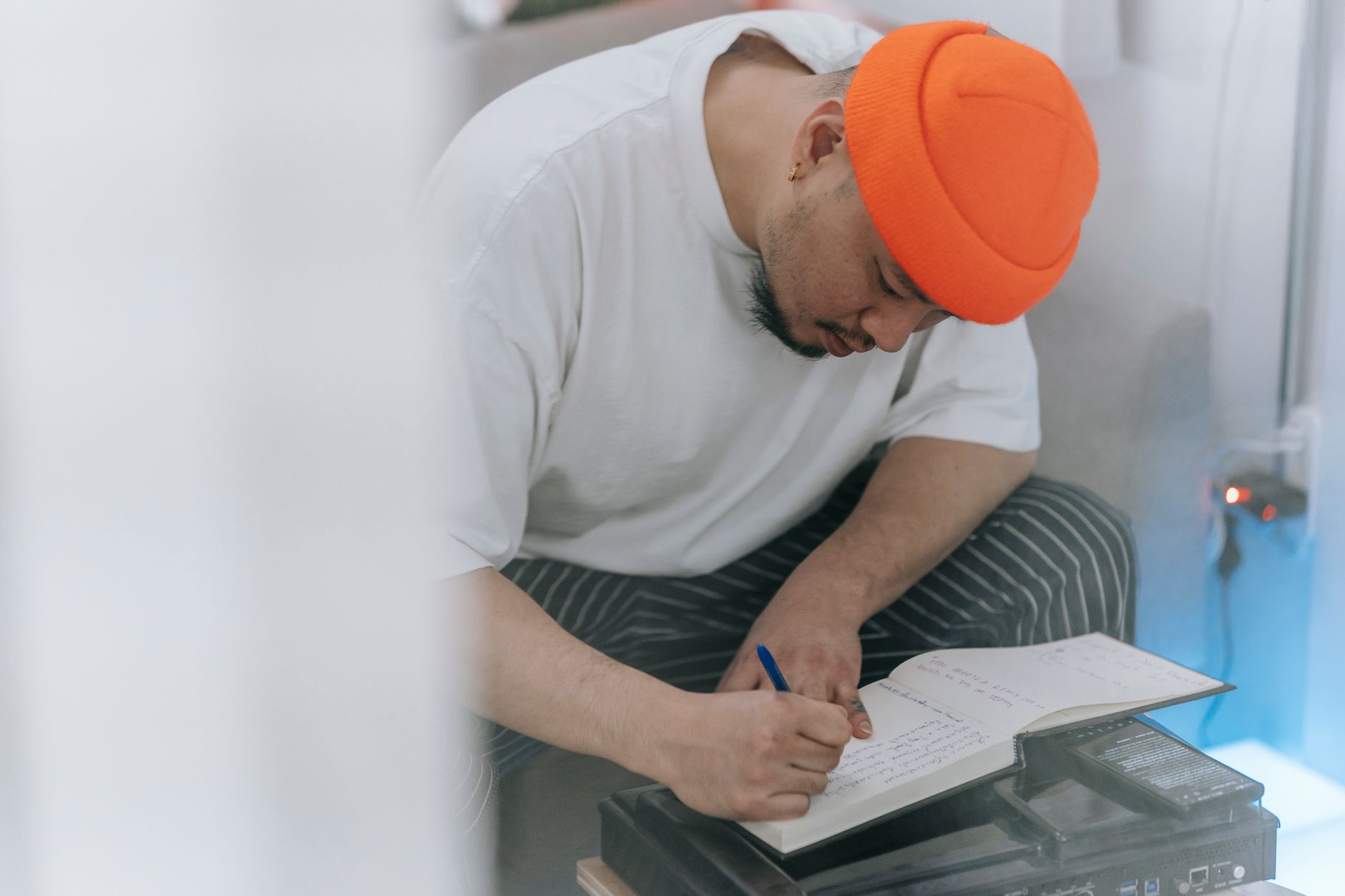 musician planning notebook desk (Photo: Anna Pou / Pexels)
