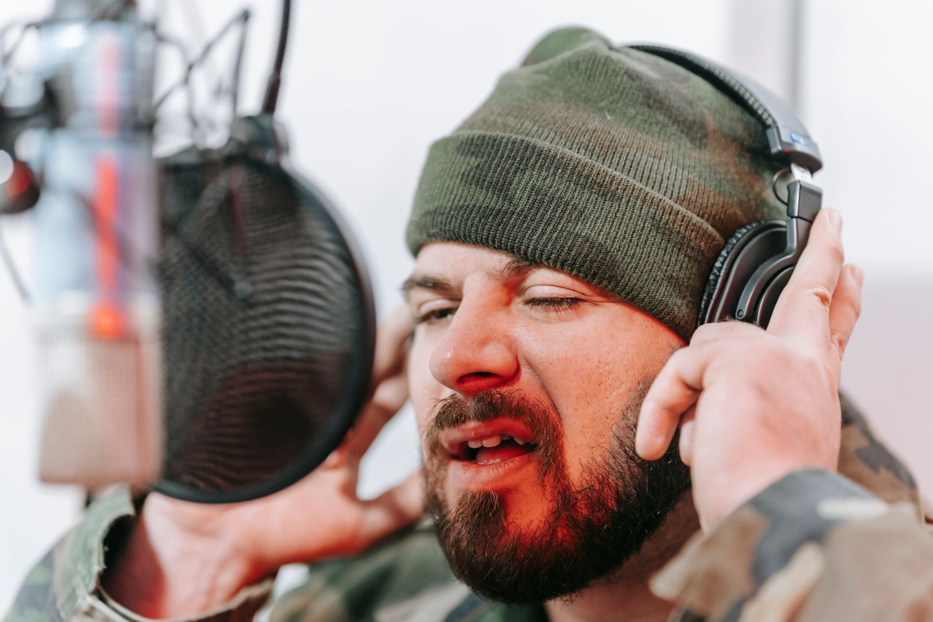 tired singer headphones studio (Photo: Anna Pou / Pexels)