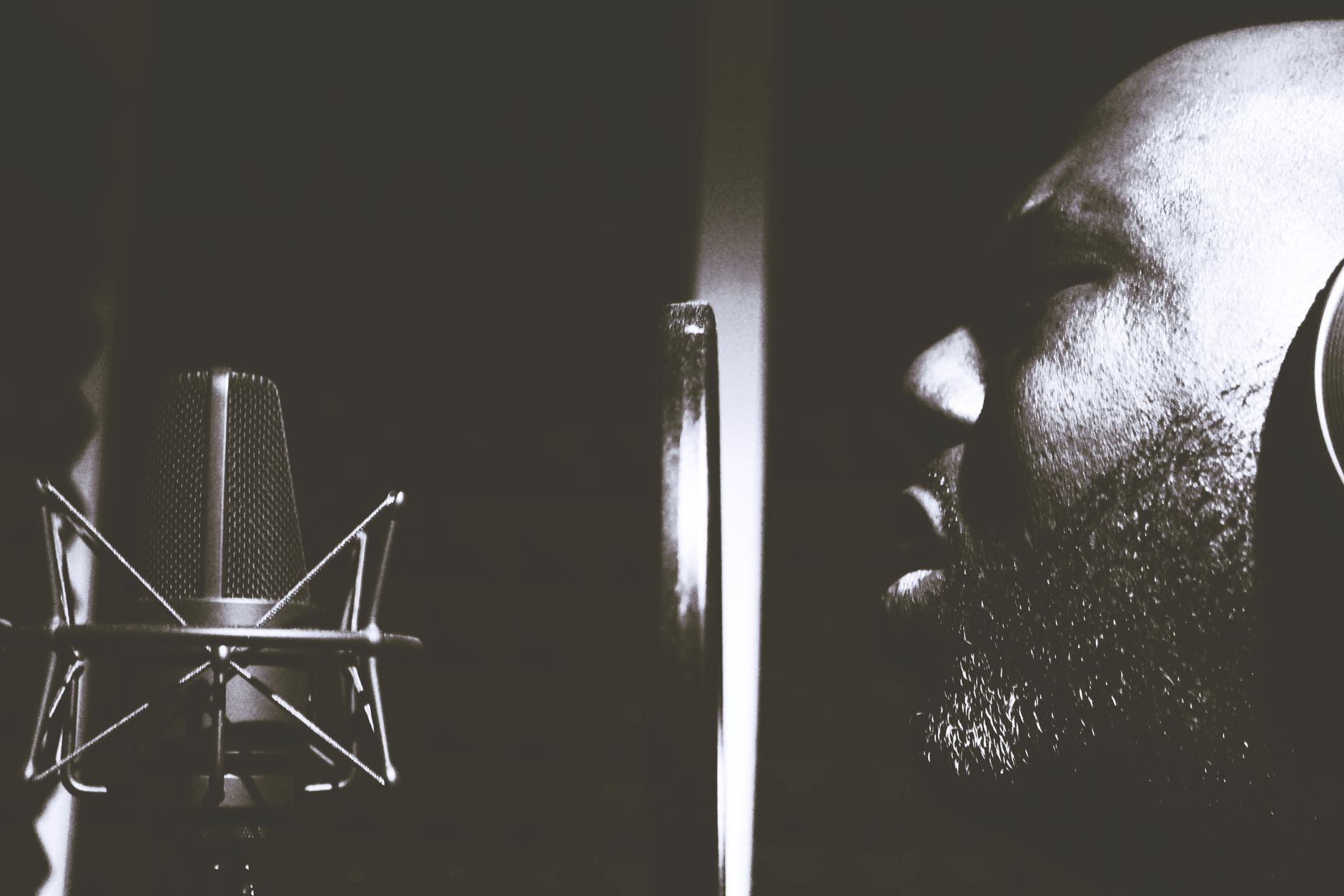 singer microphone recording booth (Photo: George Becker / Pexels)
