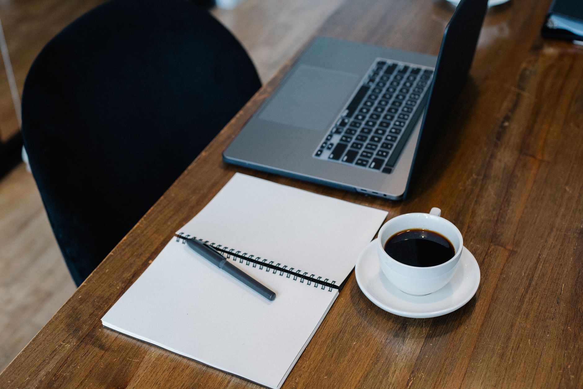 sunlit desk coffee notebook (Photo: Sora Shimazaki / Pexels)