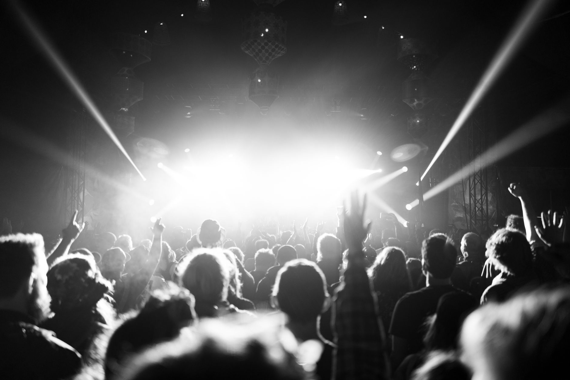 concert stage spotlight crowd (Photo: Guy Joben / Pexels)