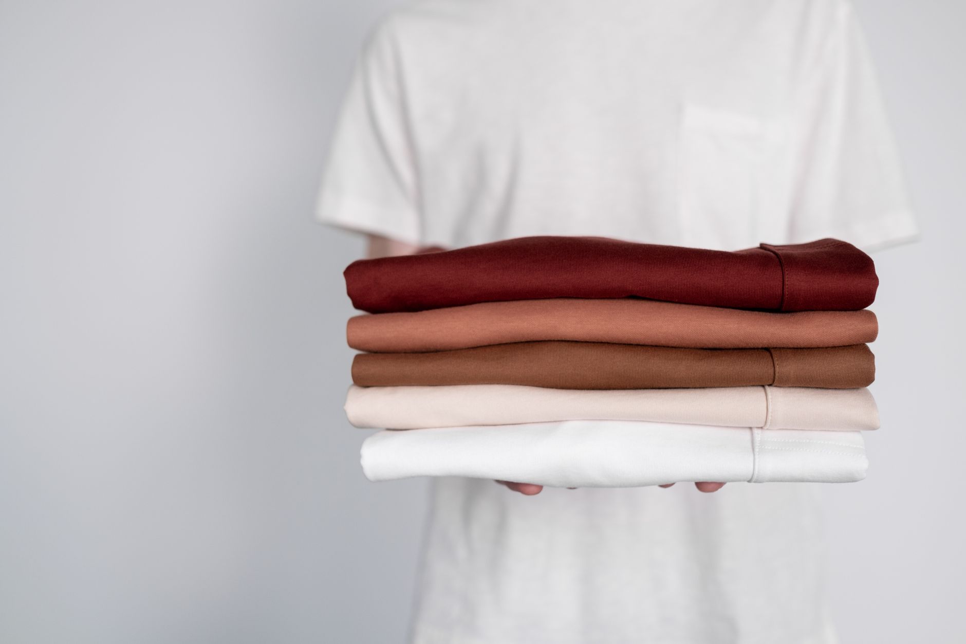 folded blank tshirts stack (Photo: Ron Lach / Pexels)