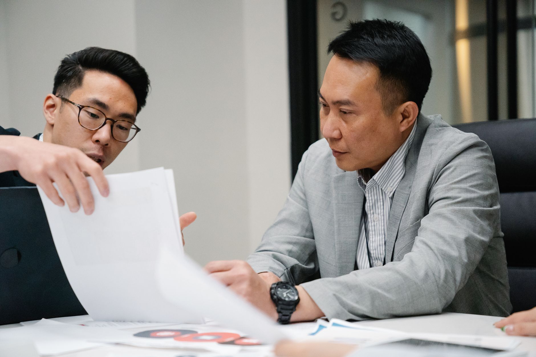 two people reviewing paper (Photo: Felicity Tai / Pexels)