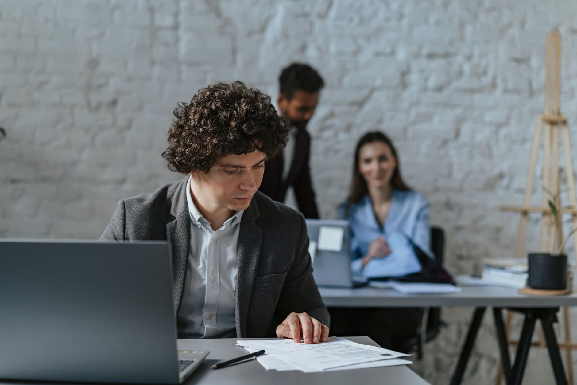 person laptop documents desk (Photo: olia danilevich / Pexels)
