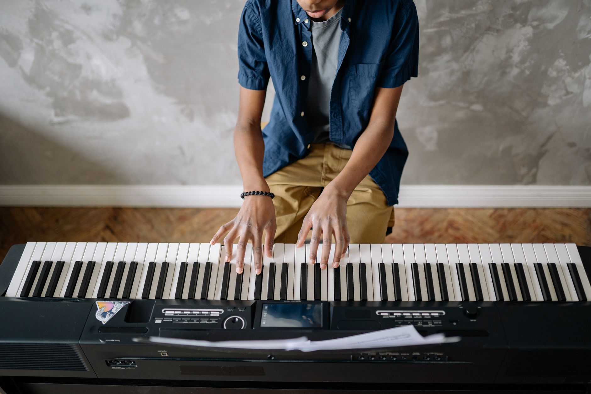 person playing piano keys (Photo: Yan Krukau / Pexels)