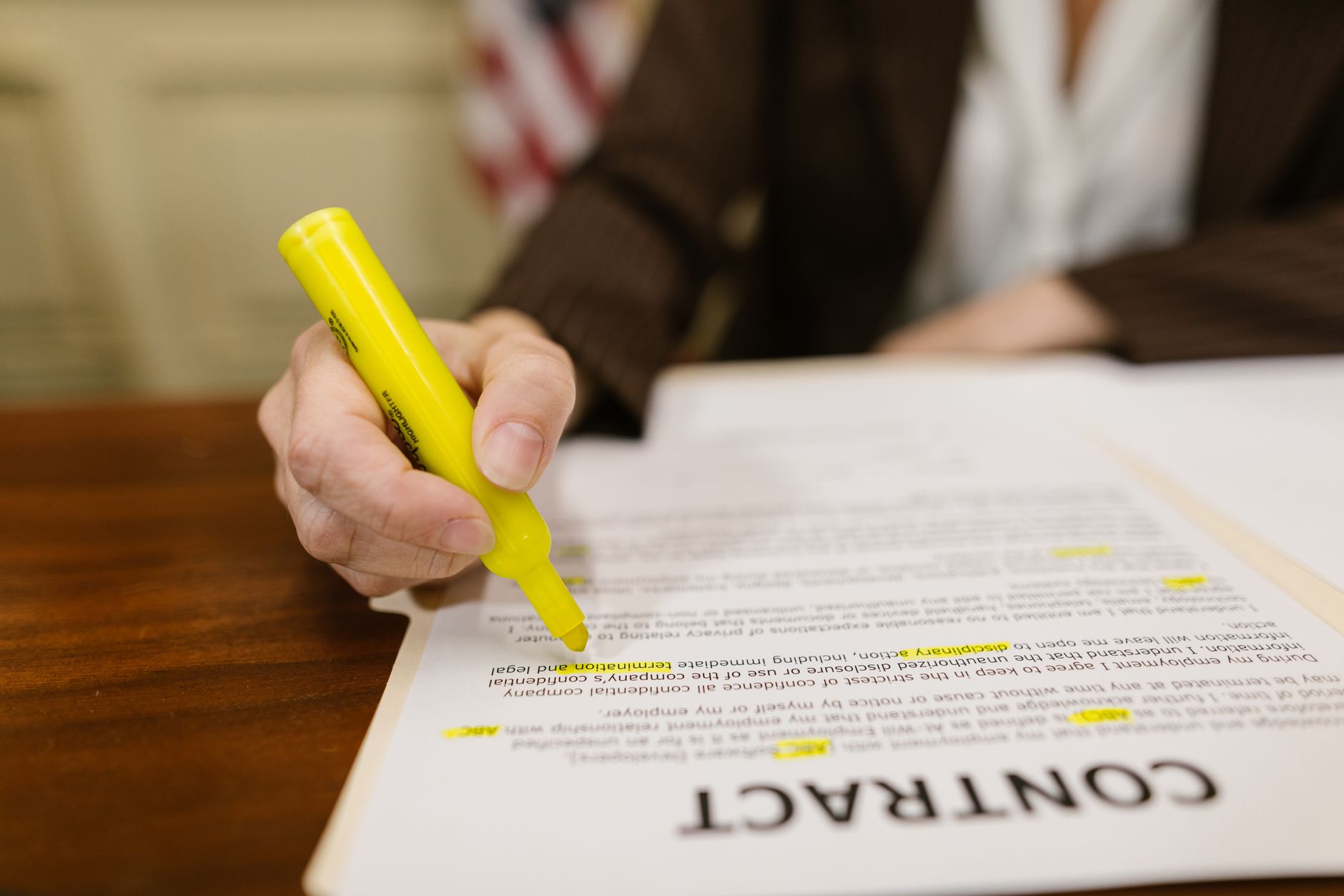 reading contract careful desk (Photo: RDNE Stock project / Pexels)