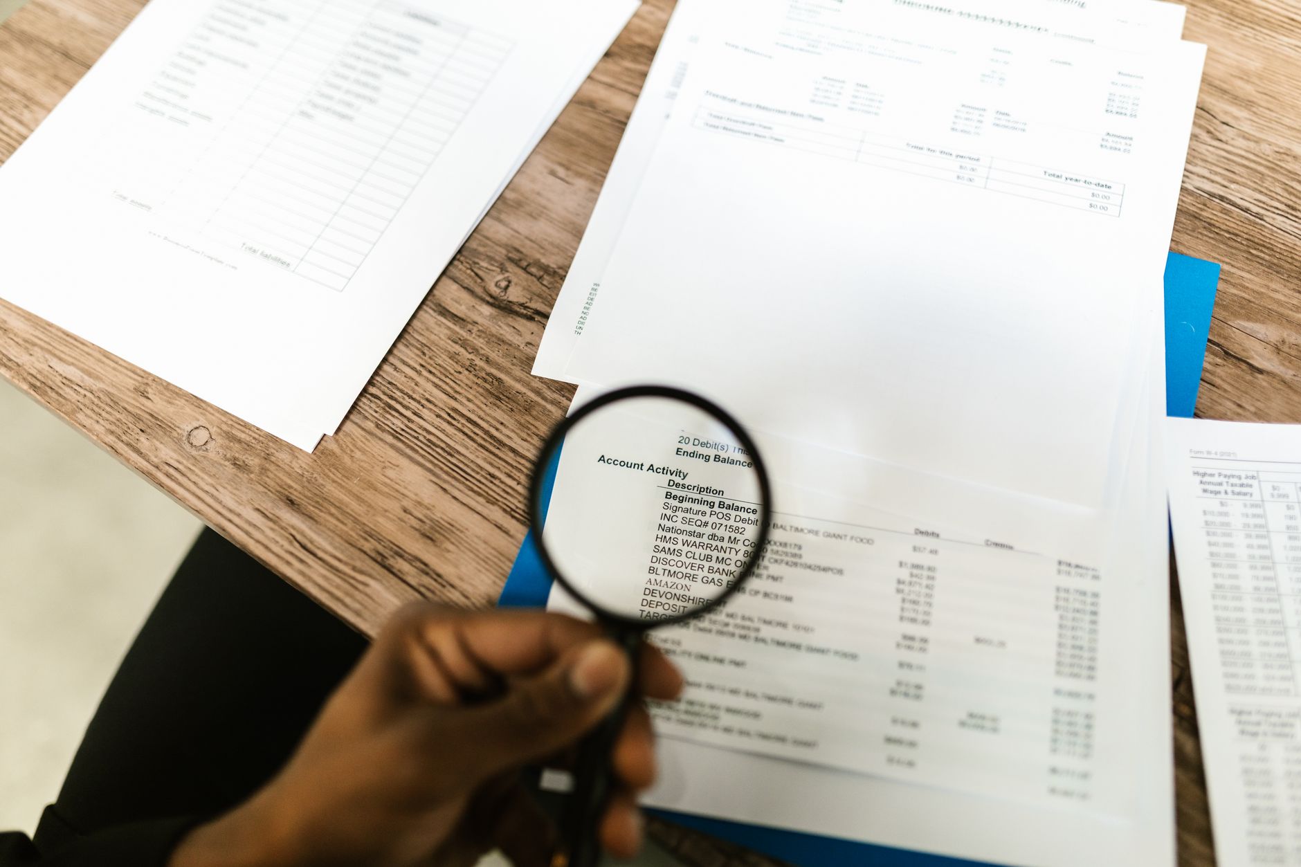 magnifying glass document check (Photo: RDNE Stock project / Pexels)