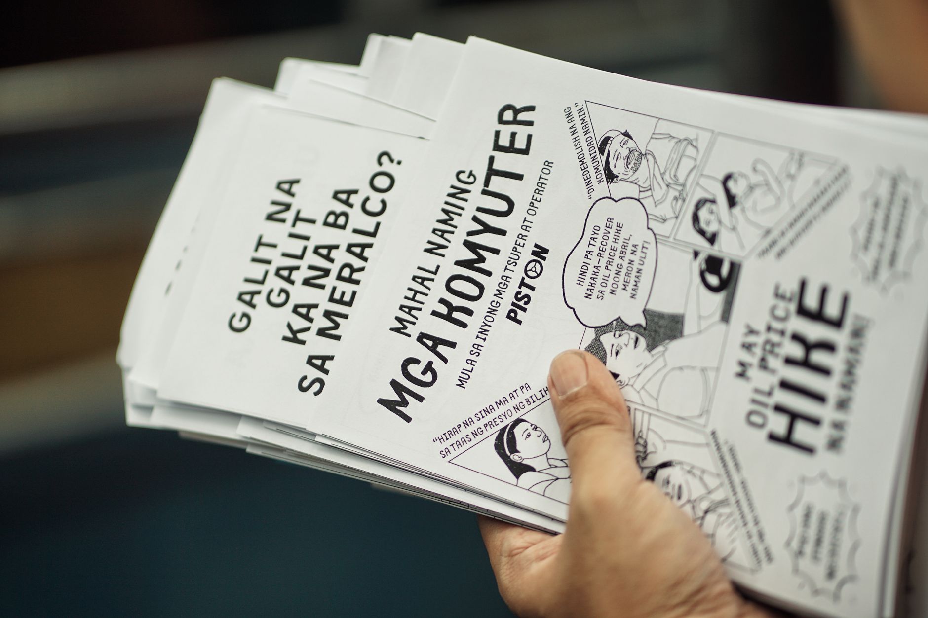 printed flyers merchandise table (Photo: Mico Medel / Pexels)