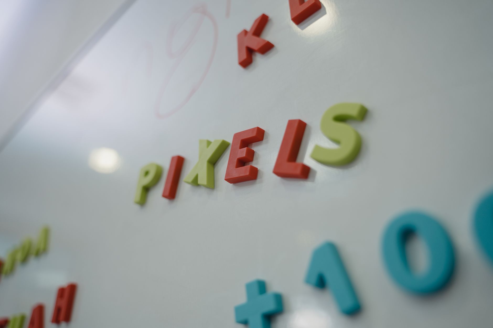 hand erasing whiteboard word (Photo: Tima Miroshnichenko / Pexels)
