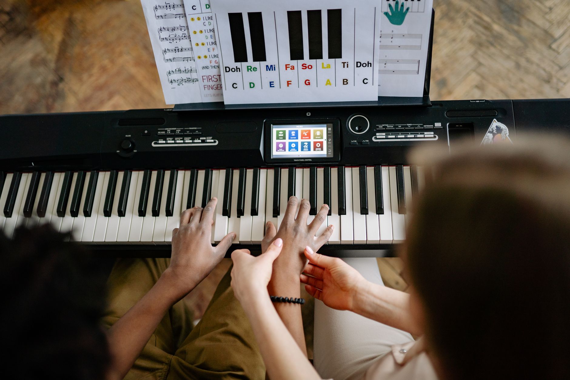 hands playing piano chords (Photo: Yan Krukau / Pexels)