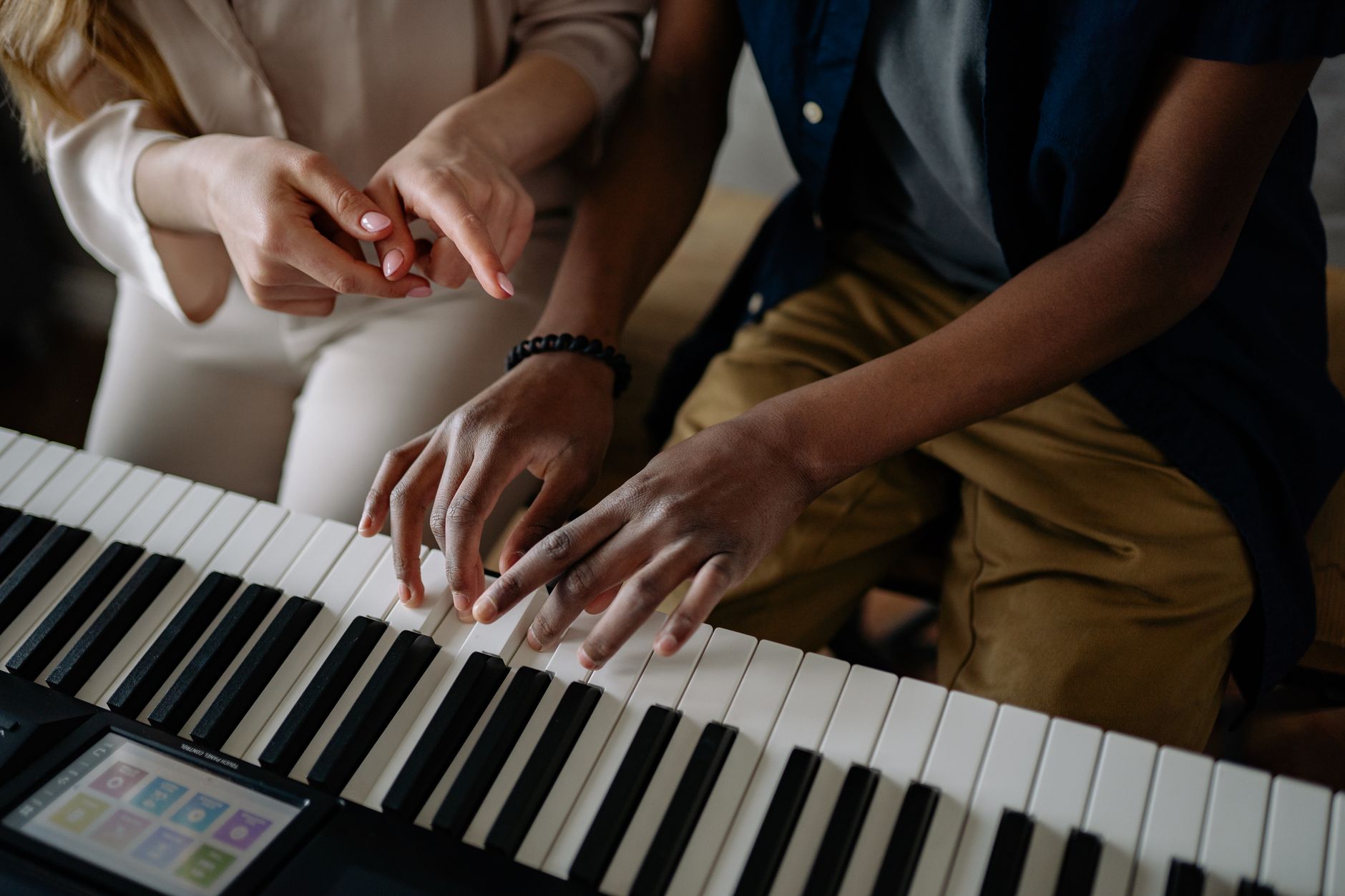 hands playing piano chord (Photo: Yan Krukau / Pexels)