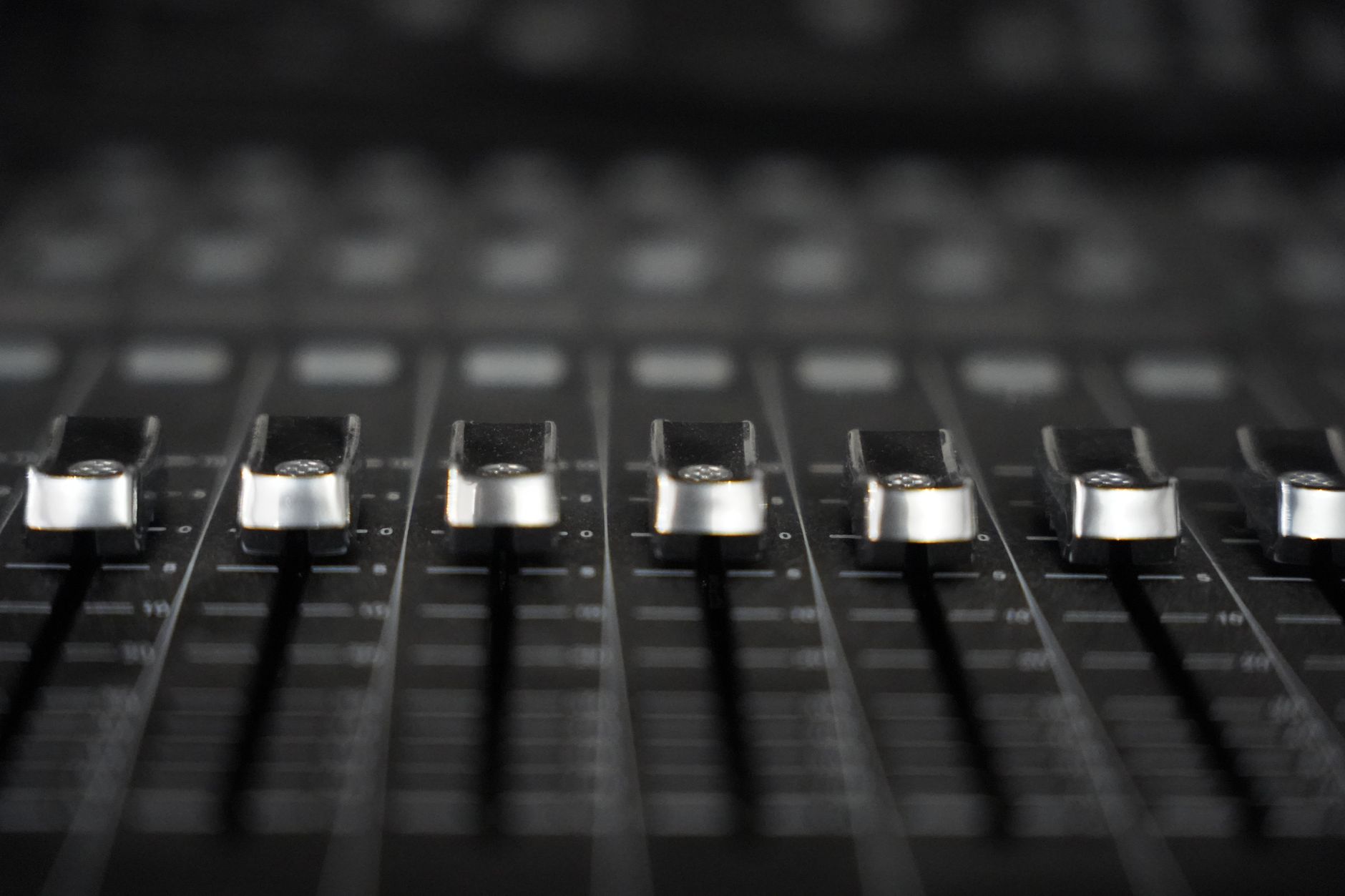 mixing console faders (Photo: David Maat / Pexels)