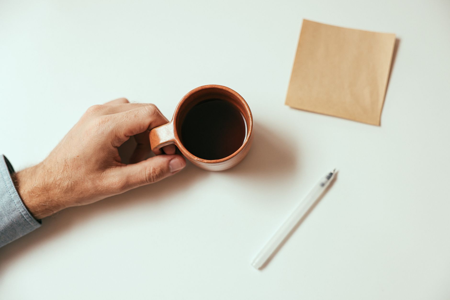warm morning desk coffee guitar (Photo: Cup of Couple / Pexels)