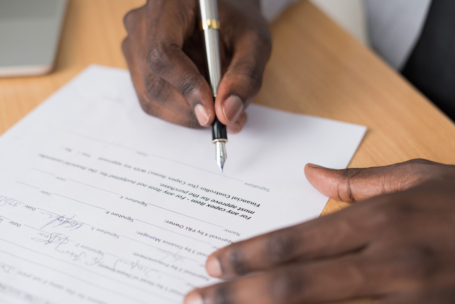 contract document signing pen (Photo: Cytonn Photography / Pexels)
