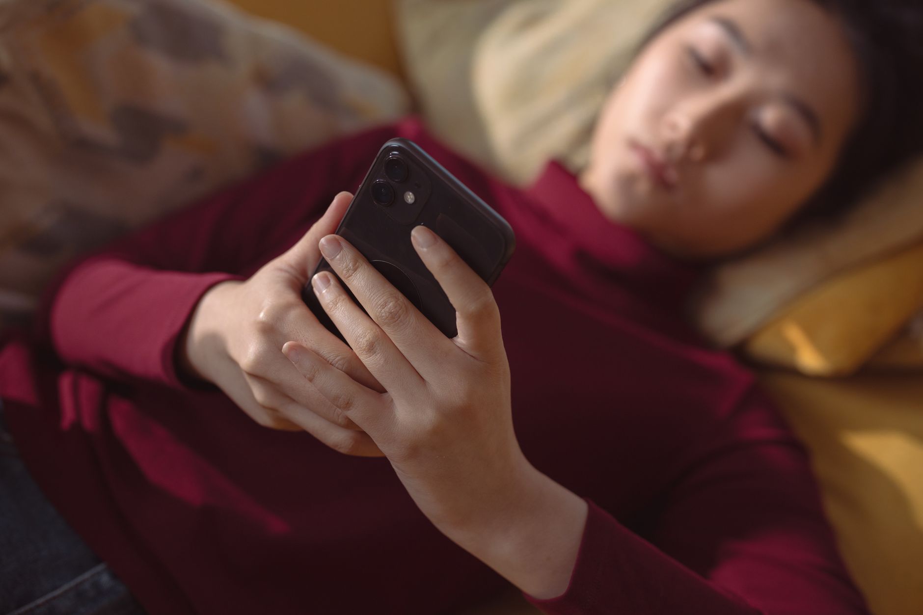 person resting with phone (Photo: cottonbro studio / Pexels)