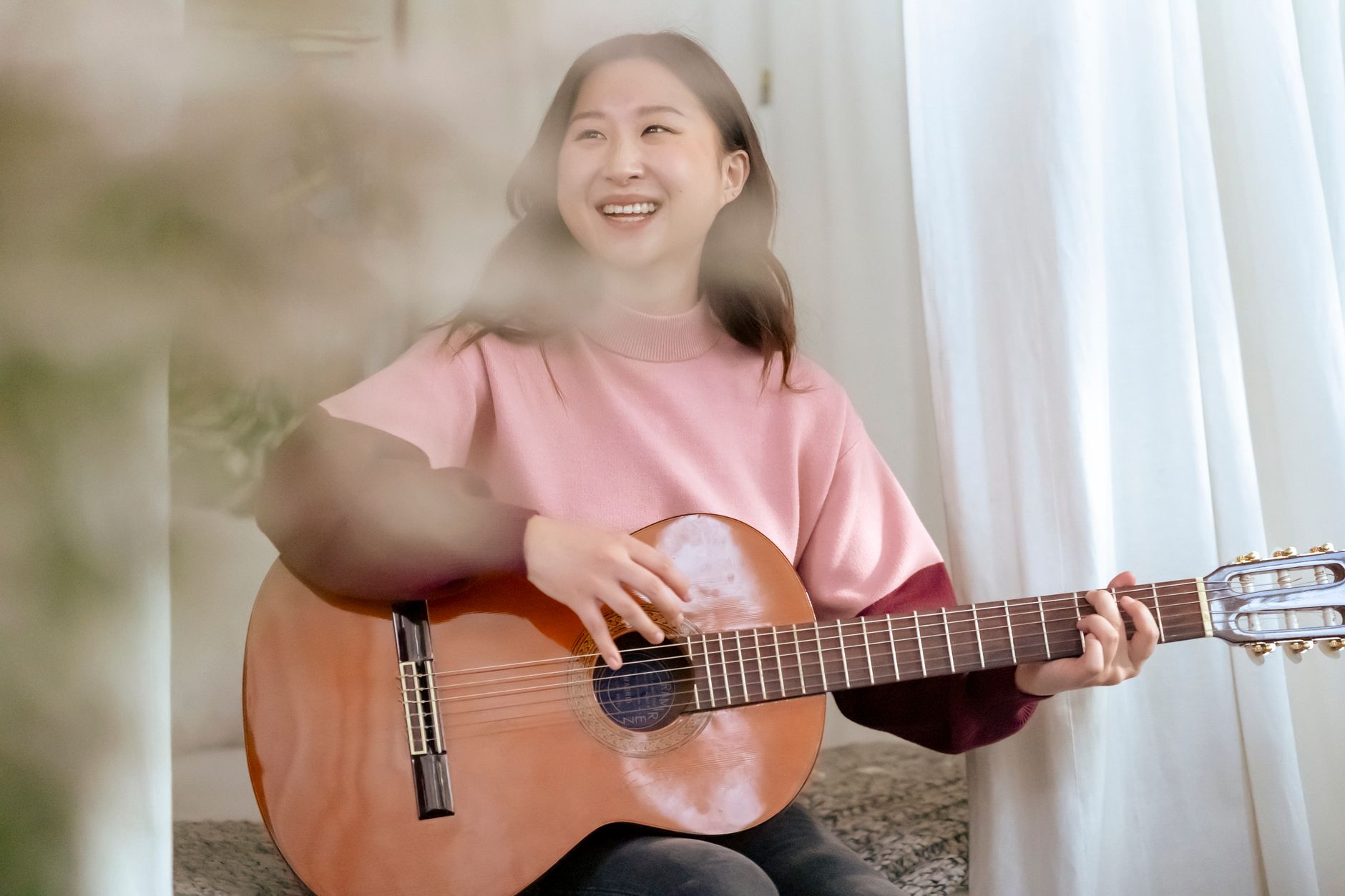 young musician guitar smiling (Photo: Charles Parker / Pexels)