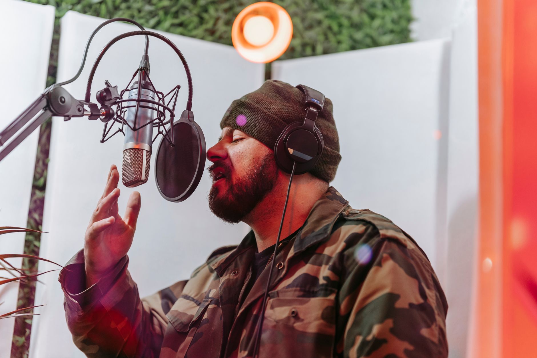 singer recording vocal booth (Photo: Anna Pou / Pexels)