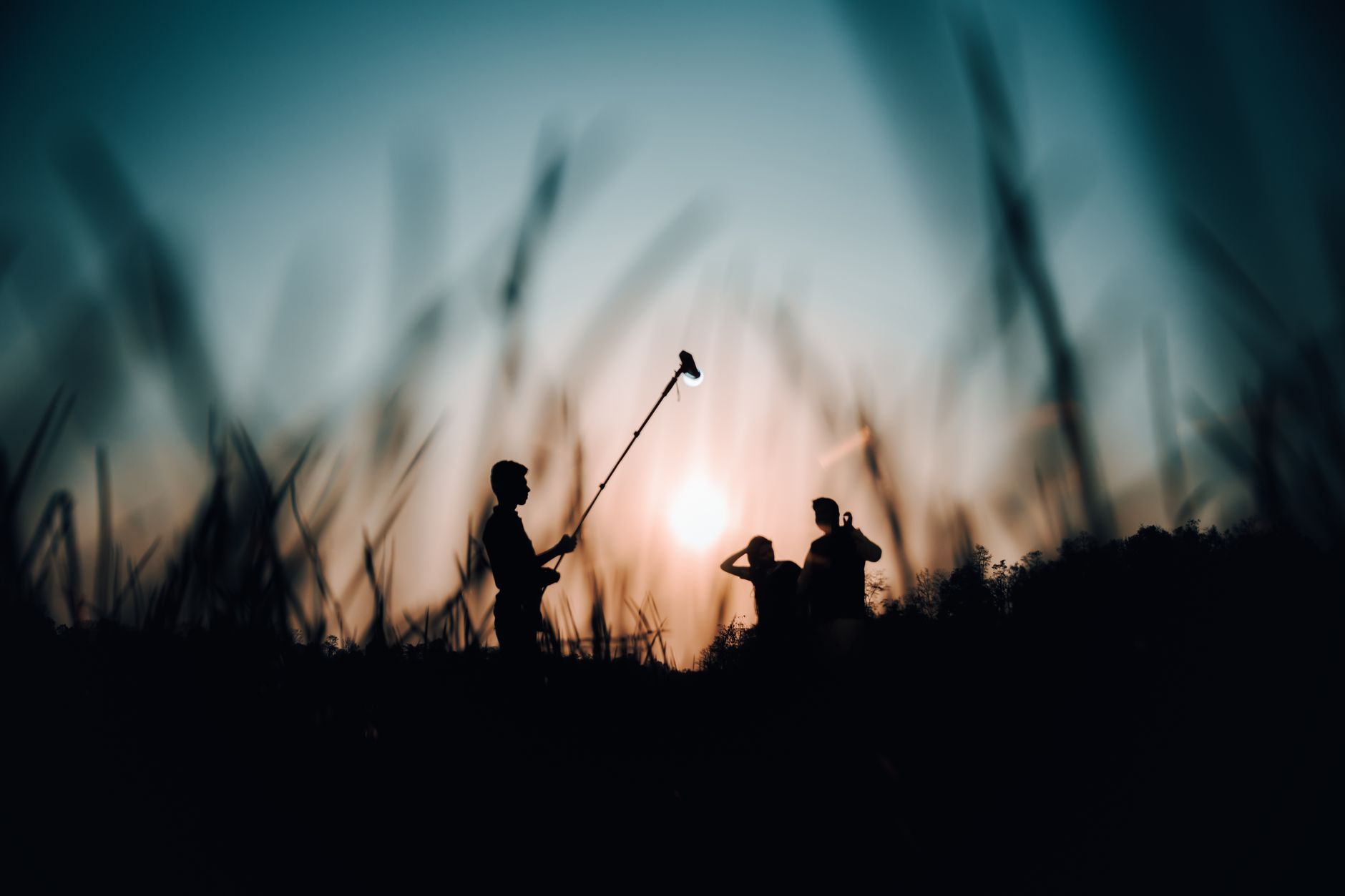 musician filming sunset field (Photo: Suraj  Behra / Pexels)