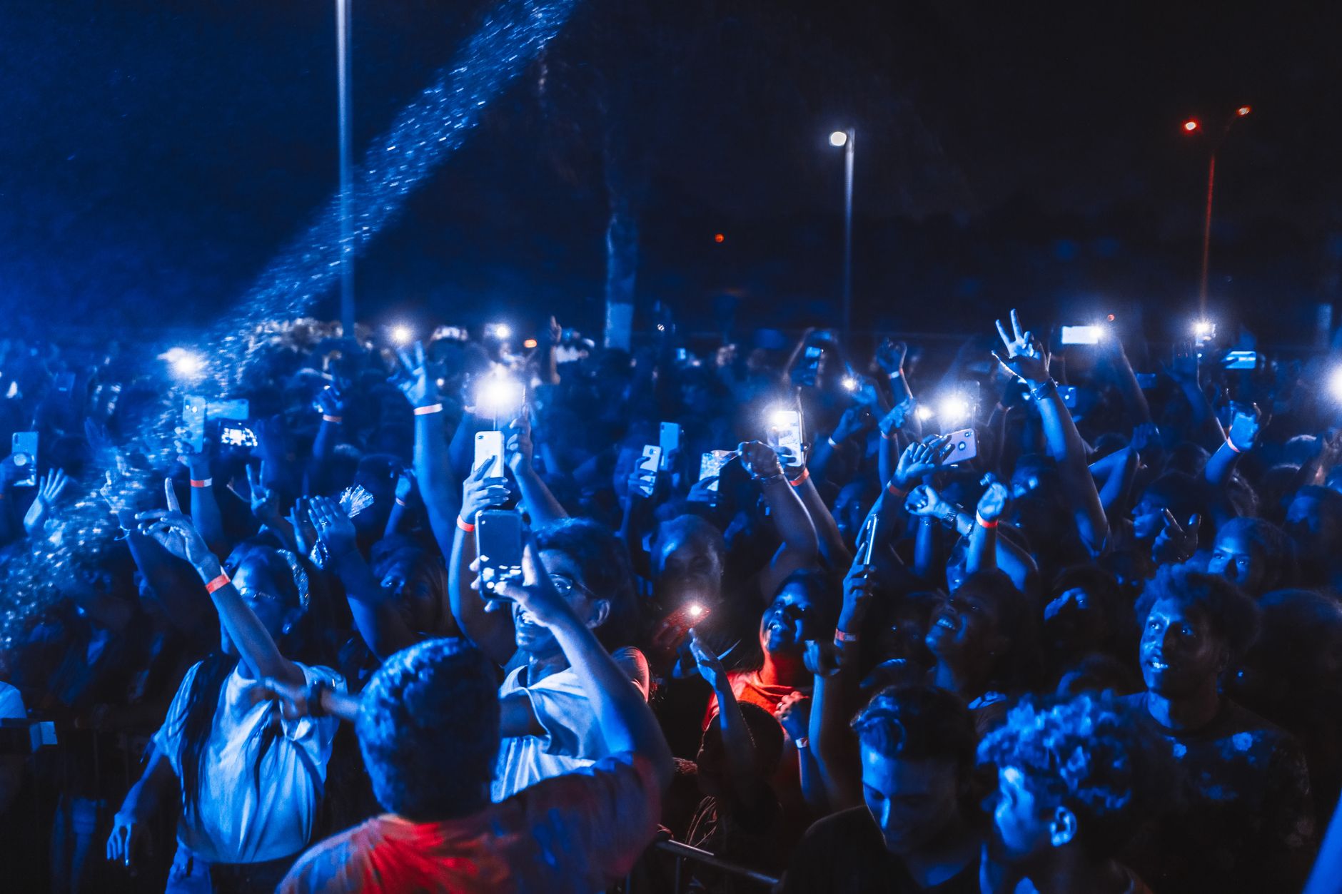 phone posting concert flyer (Photo: Luis Quintero / Pexels)