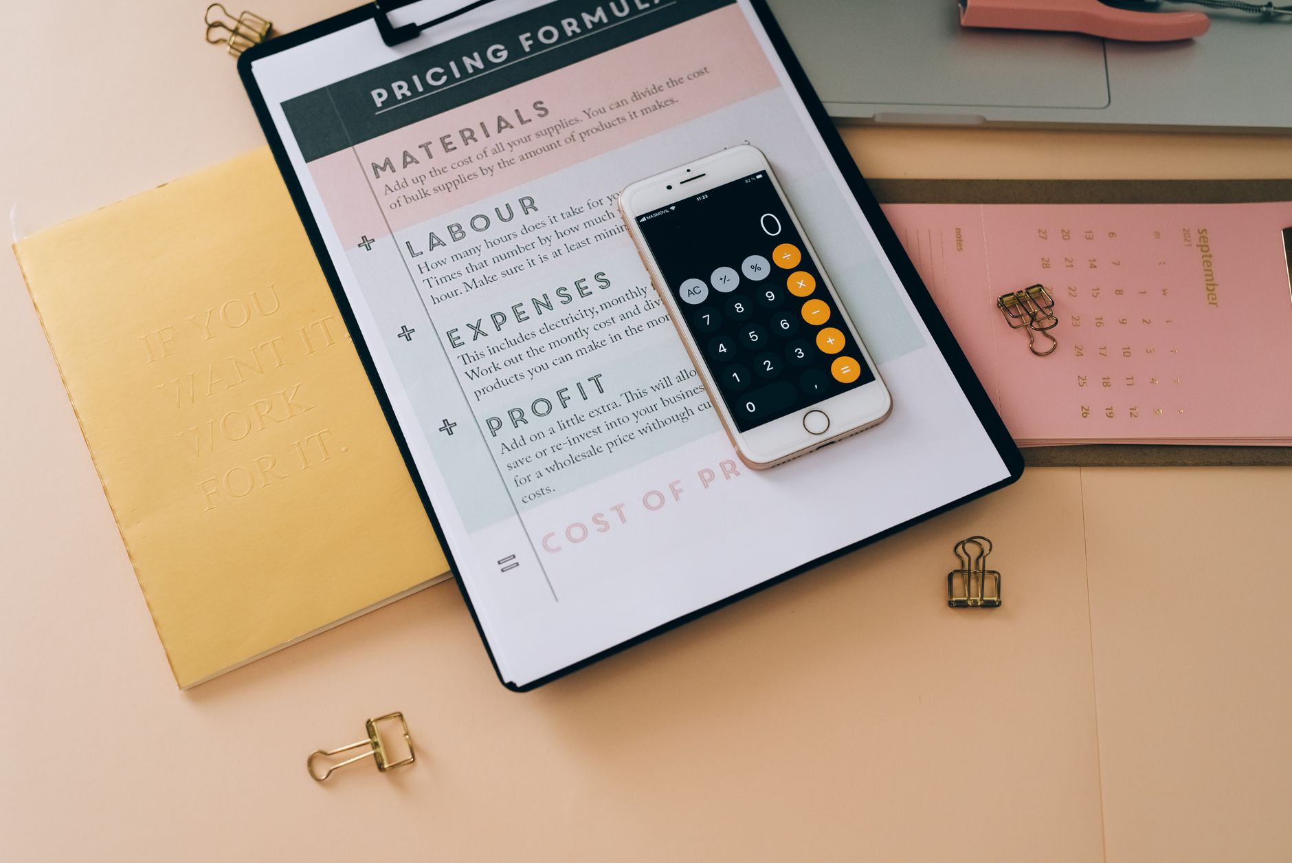 calculator pricing notebook (Photo: Leeloo The First / Pexels)