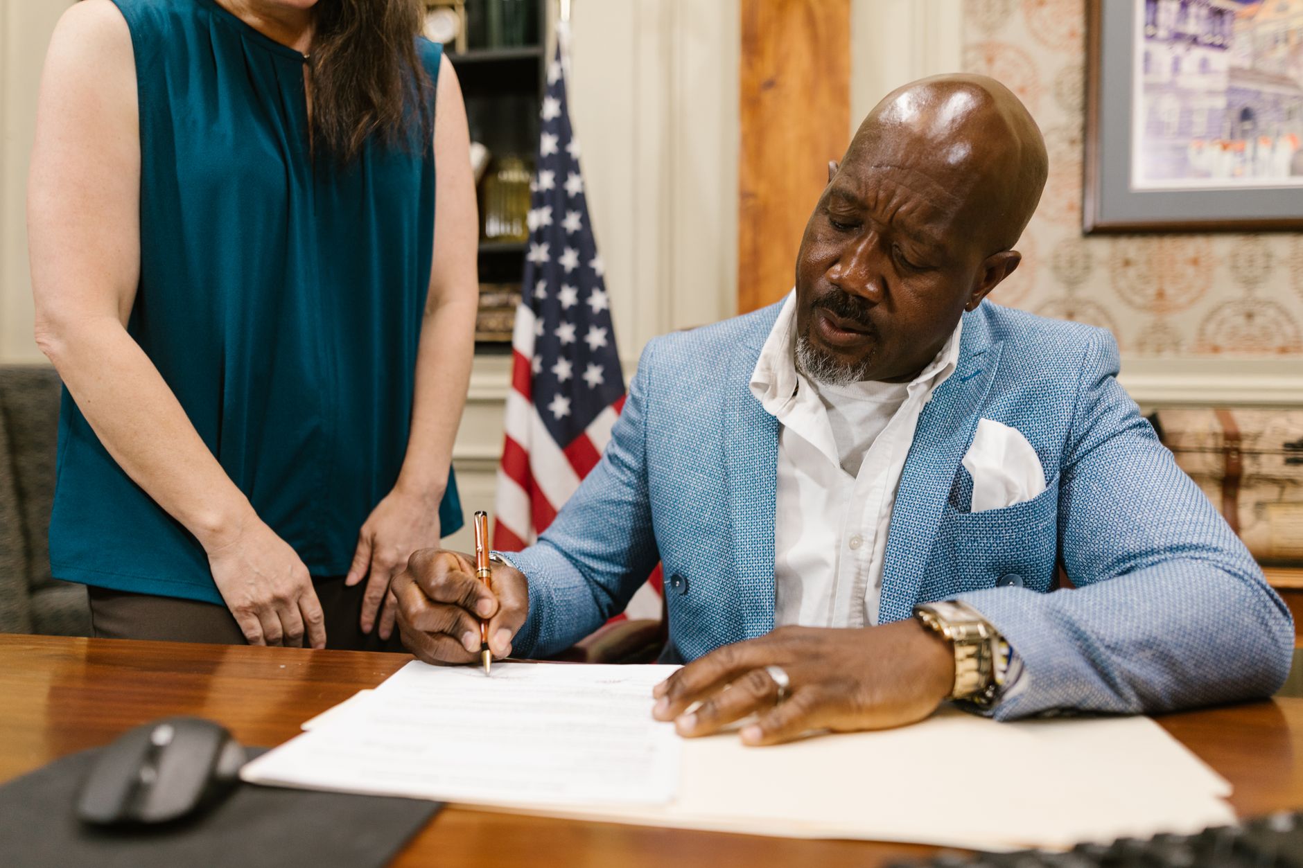 musician signing documents studio (Photo: RDNE Stock project / Pexels)