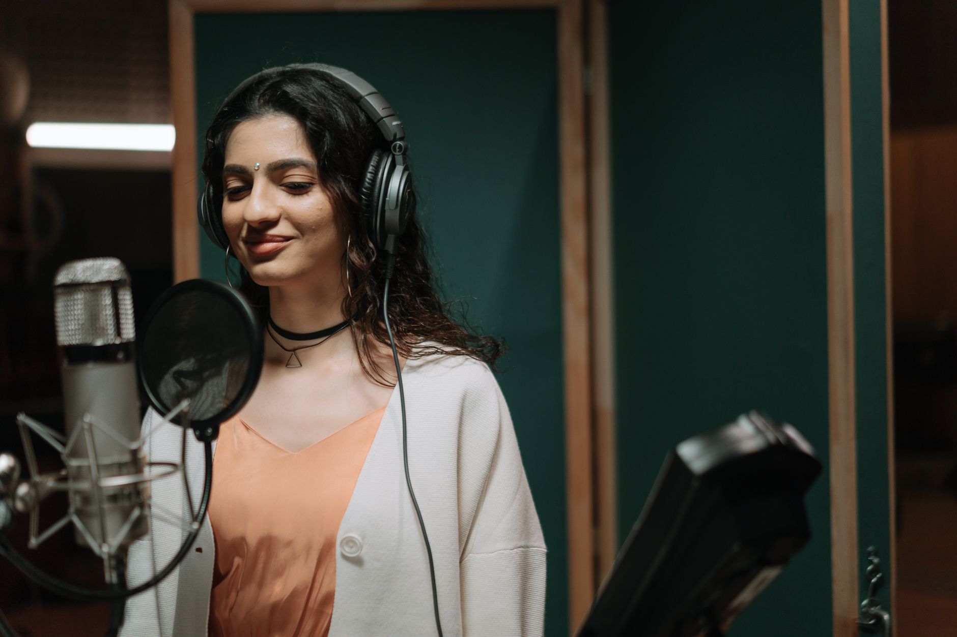 two singers recording booth (Photo: cottonbro studio / Pexels)