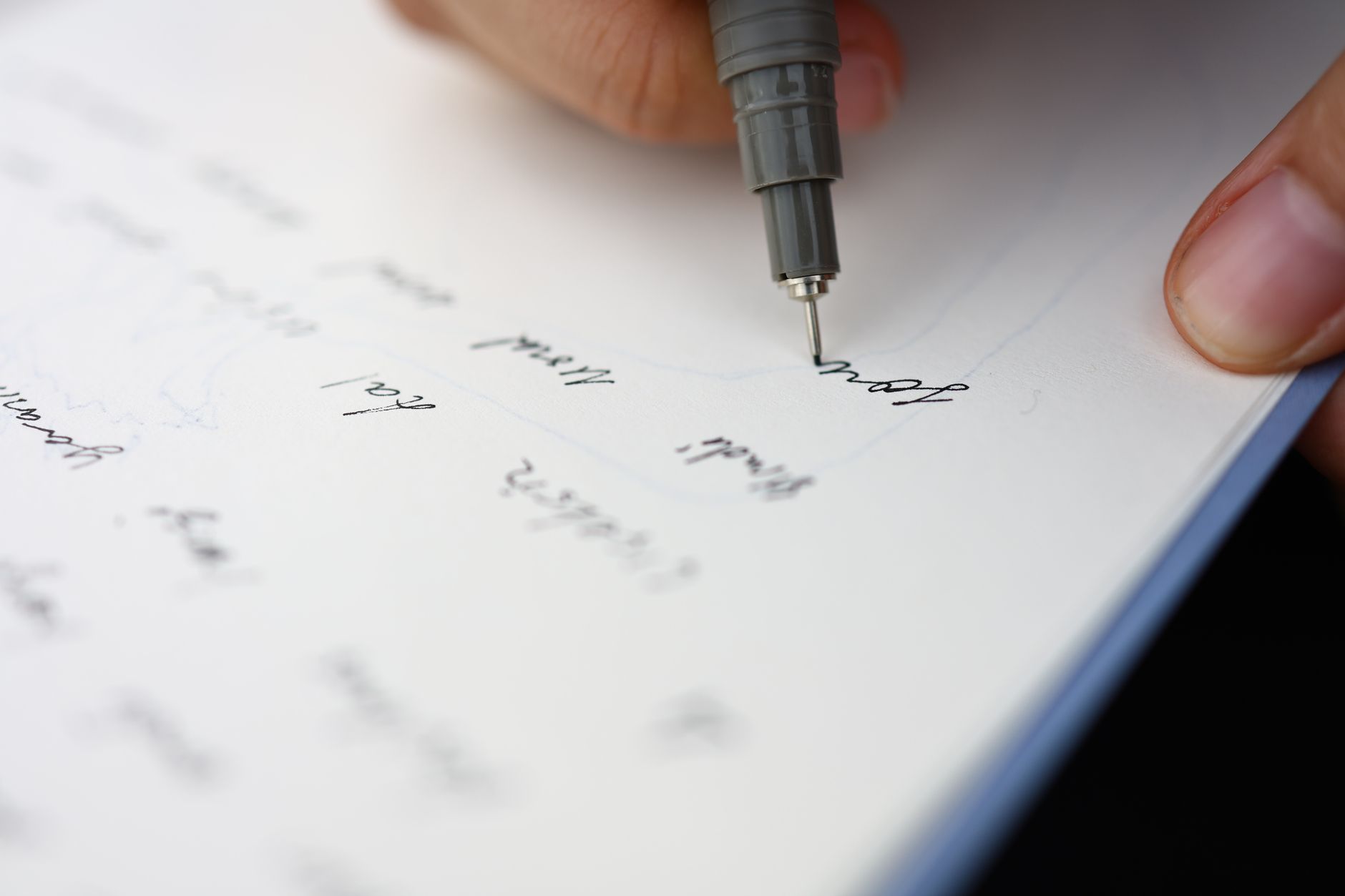 handwritten lyrics notebook pen (Photo: Esmanur Güler / Pexels)